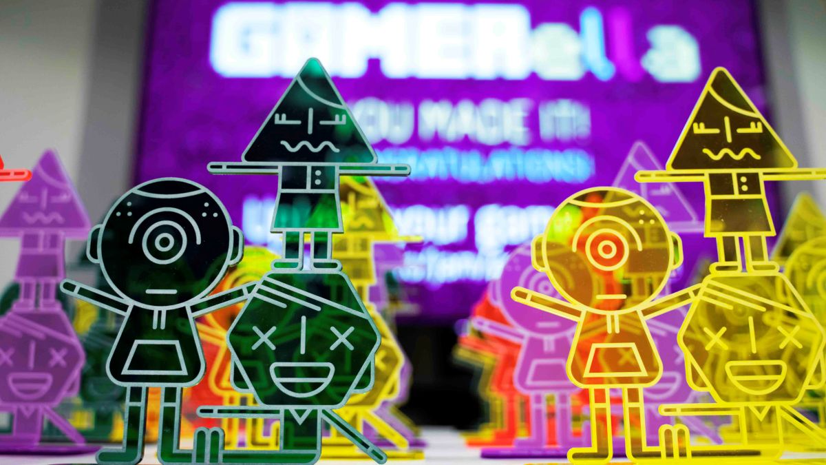 GAMERella trophies in front of a screen